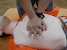 Photo: Hands clasped, elbows extended