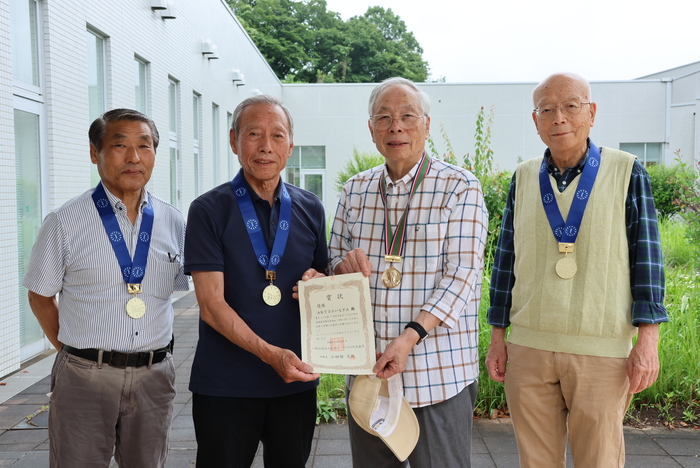 Group photo of the four winners